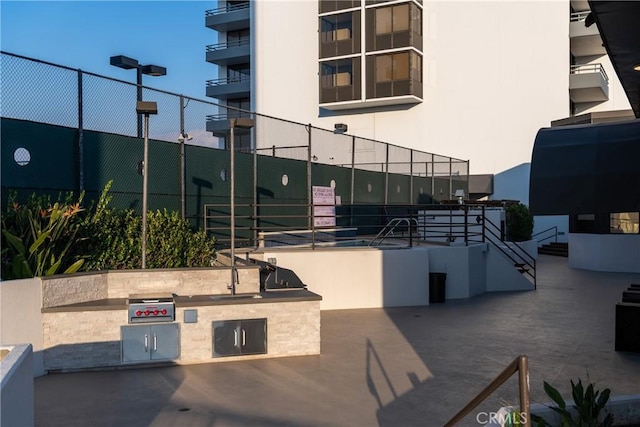 345 Pioneer Dr Unit 1705, Glendale, CA 91203 - view of patio featuring exterior kitchen