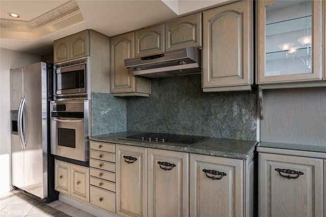 345 Pioneer Dr Unit 1705, Glendale, CA 91203 - kitchen featuring stainless steel appliances, under cabinet range hood, backsplash, glass insert cabinets, and light tile patterned flooring