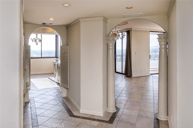 345 Pioneer Dr Unit 1705, Glendale, CA 91203 - hall with arched walkways, baseboards, a chandelier, recessed lighting, and inlaid floor details