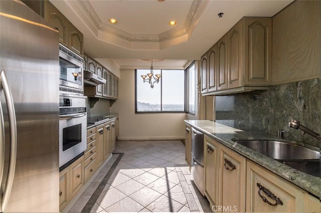 345 Pioneer Dr Unit 1705, Glendale, CA 91203 - kitchen with appliances with stainless steel finishes, baseboards, recessed lighting, decorative backsplash, and a chandelier