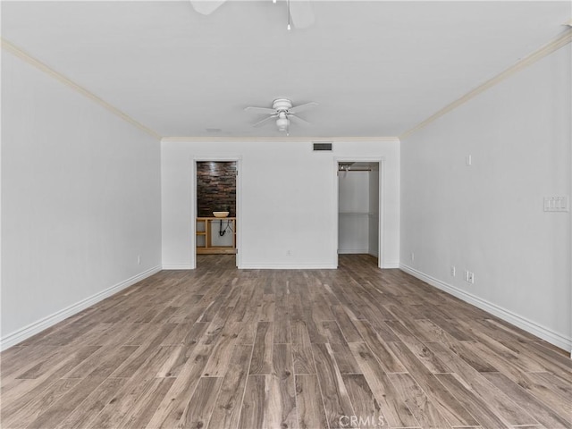 6608 Via Siena, Rancho Palos Verdes, CA 90275 - spare room with ceiling fan, wood finished floors, crown molding, and baseboards