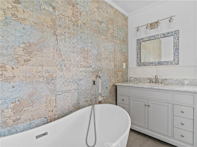 6608 Via Siena, Rancho Palos Verdes, CA 90275 - bathroom with crown molding, a freestanding bath, vanity, tile walls, and tile patterned floors