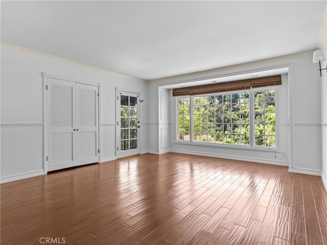 6608 Via Siena, Rancho Palos Verdes, CA 90275 - unfurnished living room with crown molding, wood finished floors, and baseboards