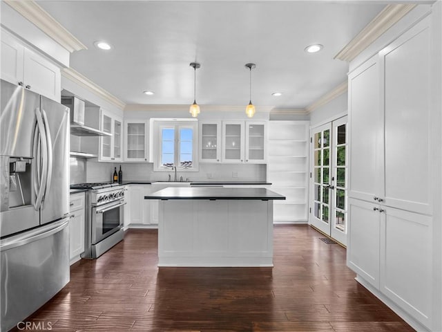 6608 Via Siena, Rancho Palos Verdes, CA 90275 - kitchen with stainless steel appliances, wall chimney range hood, ornamental molding, open shelves, and healthy amount of natural light