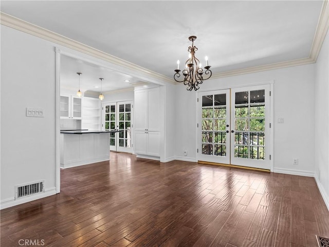 6608 Via Siena, Rancho Palos Verdes, CA 90275 - unfurnished living room featuring french doors, a chandelier, dark wood finished floors, crown molding, and baseboards