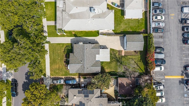 birds eye view of property with a residential view