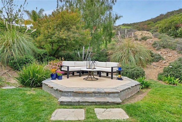 exterior space featuring a patio and an outdoor living space