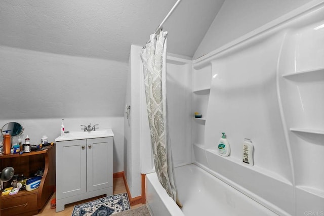 37650 Tripp Flats Rd, Anza, CA 92539 - bathroom with shower / tub combo, vaulted ceiling, and a sink