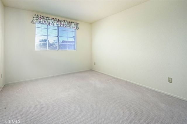 6721 Silver Oak Pl, Riverside, CA 92506 - unfurnished room featuring baseboards and light carpet
