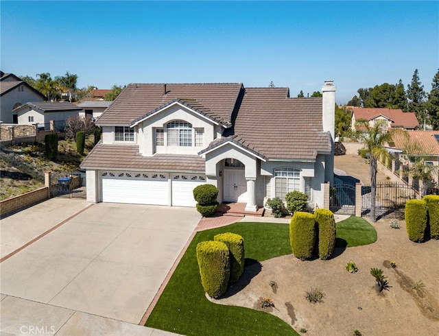 6721 Silver Oak Pl, Riverside, CA 92506 - traditional-style house featuring a gate, fence, stucco siding, driveway, and a garage