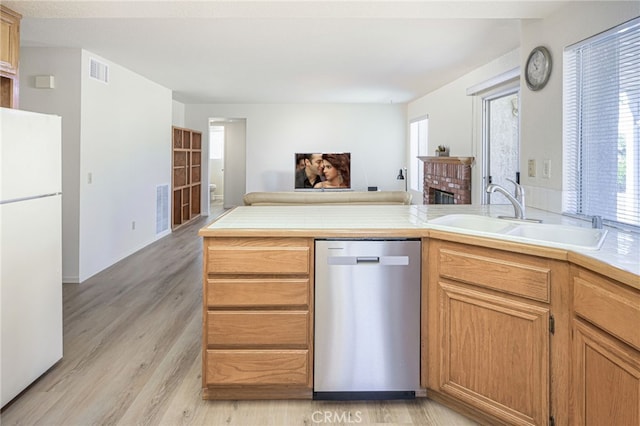 6721 Silver Oak Pl, Riverside, CA 92506 - kitchen with dishwasher, a sink, visible vents, and freestanding refrigerator