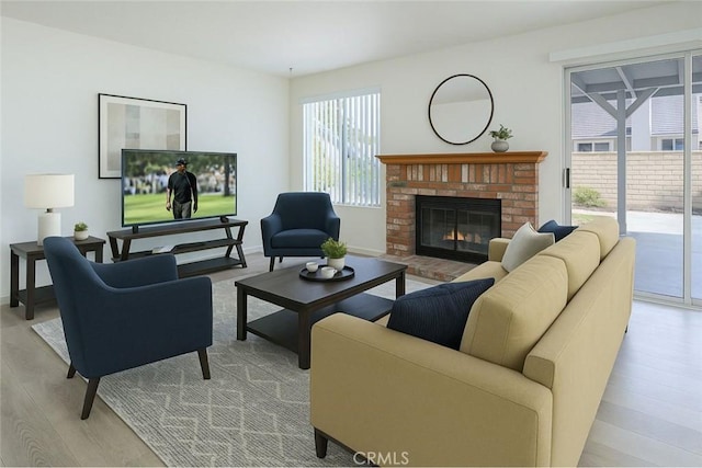 6721 Silver Oak Pl, Riverside, CA 92506 - living area featuring a fireplace and light wood-style floors