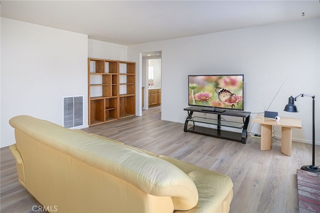 6721 Silver Oak Pl, Riverside, CA 92506 - living room with baseboards, wood finished floors, and visible vents