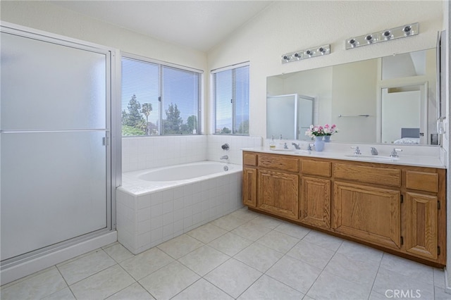 6721 Silver Oak Pl, Riverside, CA 92506 - bathroom featuring vaulted ceiling, a sink, double vanity, and a stall shower