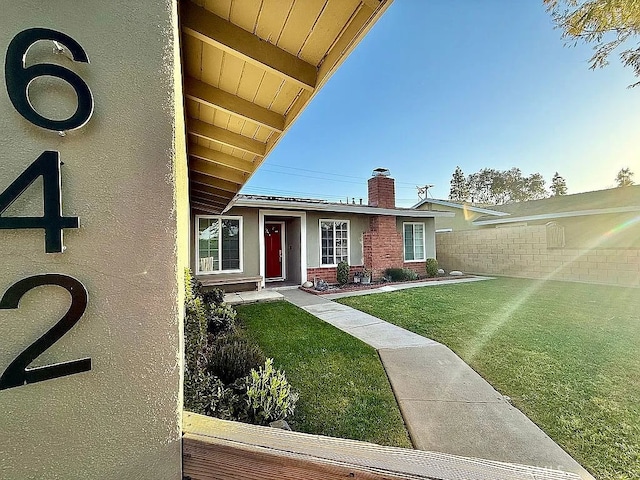 642 W Wilson St, Costa Mesa, CA 92627 - view of front of property featuring a chimney and stucco siding