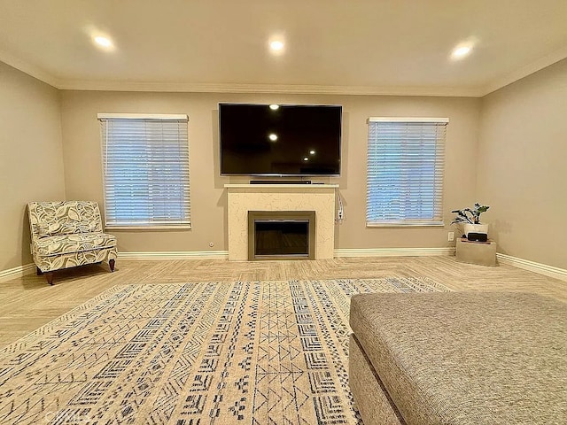 642 W Wilson St, Costa Mesa, CA 92627 - living area with baseboards, crown molding, a premium fireplace, recessed lighting, and wood finished floors