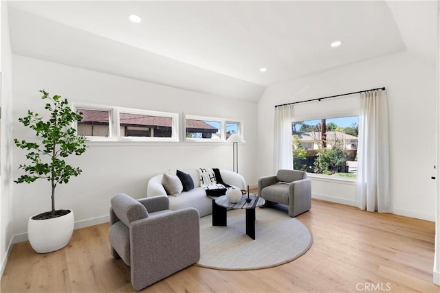 786 Carhart Ave, Fullerton, CA 92833 - living area featuring wood finished floors, vaulted ceiling, and recessed lighting
