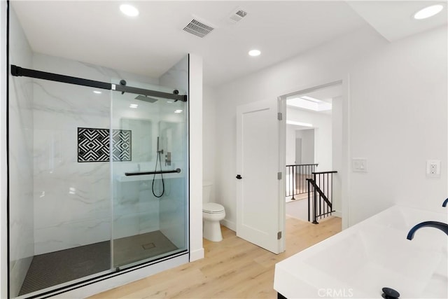 786 Carhart Ave, Fullerton, CA 92833 - bathroom featuring wood finished floors, a marble finish shower, vanity, and recessed lighting