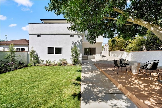 786 Carhart Ave, Fullerton, CA 92833 - rear view of property featuring stucco siding and a patio area