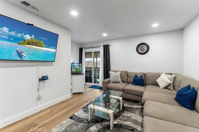 28691 Via Las Flores Unit 328, Murrieta, CA 92563 - living area with light wood-style flooring and recessed lighting