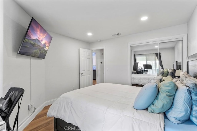 28691 Via Las Flores Unit 328, Murrieta, CA 92563 - bedroom featuring wood finished floors, a closet, and recessed lighting