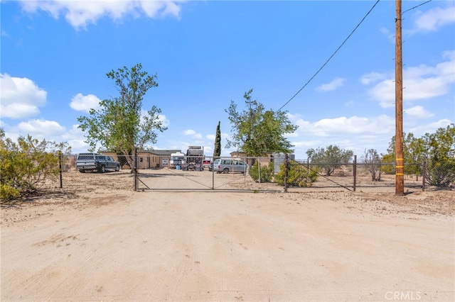 view of yard with a gate and fence