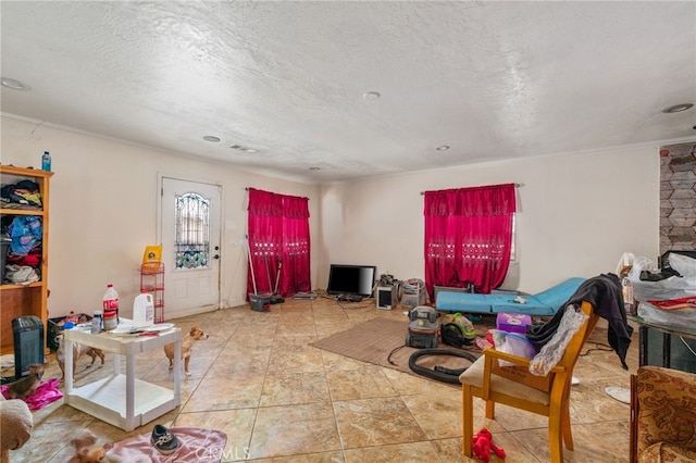 living room featuring a textured ceiling, crown molding, and visible vents