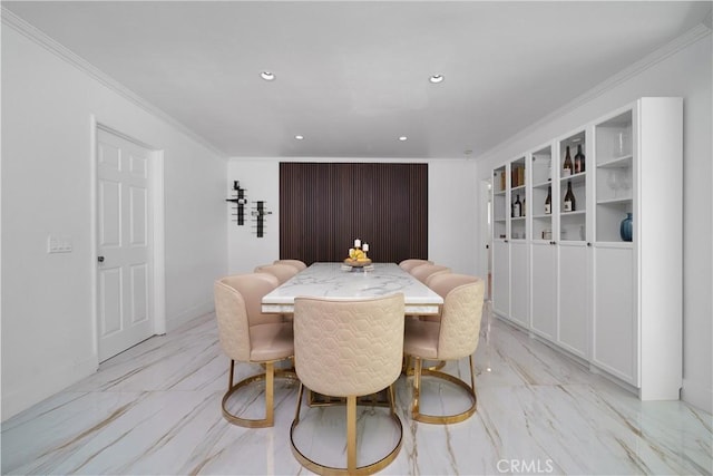 dining space with recessed lighting and ornamental molding