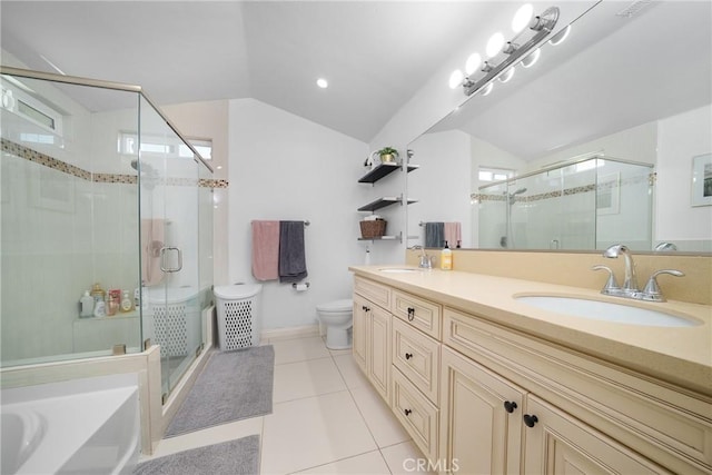 full bathroom featuring double vanity, lofted ceiling, a stall shower, and a sink