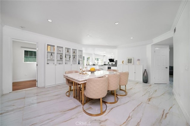 dining area with marble finish floor, baseboards, ornamental molding, and recessed lighting