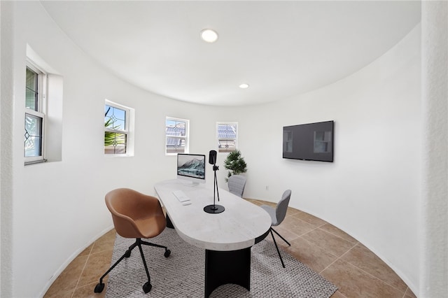 tiled office featuring recessed lighting