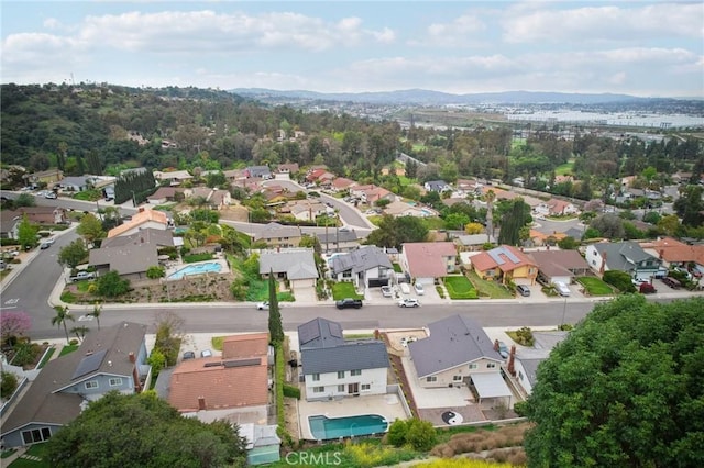 bird's eye view with a mountain view and a residential view