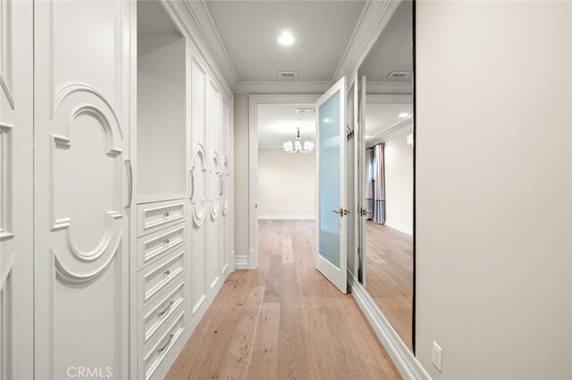 435 Walnut Ave, Arcadia, CA 91007 - corridor featuring light wood-type flooring, crown molding, a chandelier, recessed lighting, and baseboards