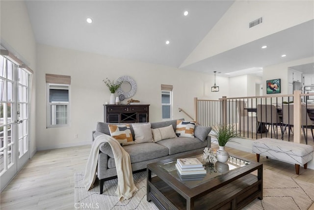 1727 Spreckels Ln, Redondo Beach, CA 90278 - living area featuring light wood-type flooring, recessed lighting, visible vents, and high vaulted ceiling