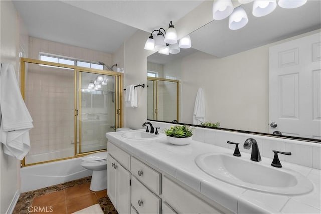 1727 Spreckels Ln, Redondo Beach, CA 90278 - bathroom featuring a sink, combined bath / shower with glass door, double vanity, and a notable chandelier