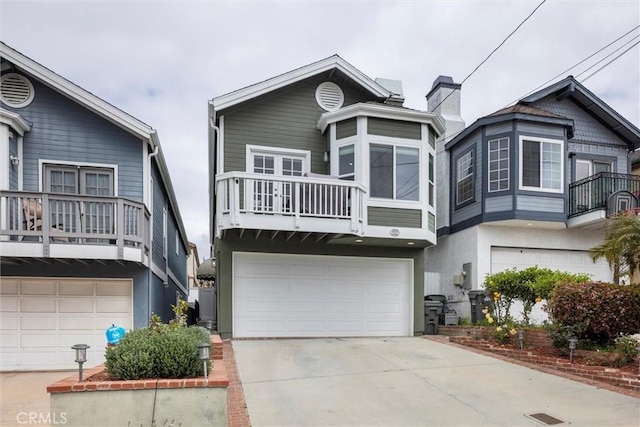 1727 Spreckels Ln, Redondo Beach, CA 90278 - view of front of house with an attached garage, driveway, a balcony, and stucco siding