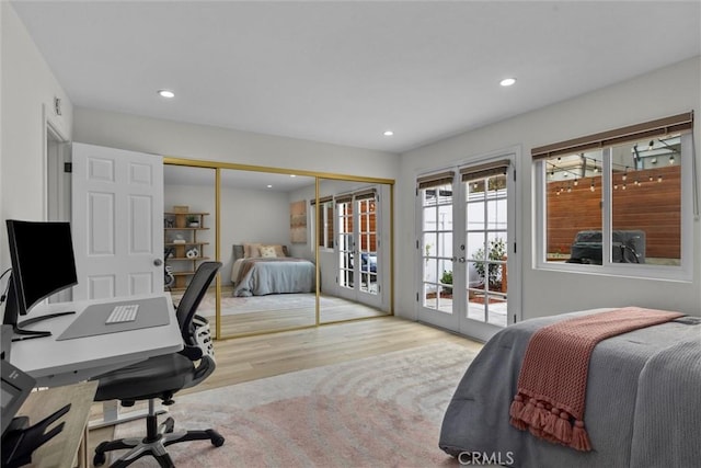 1727 Spreckels Ln, Redondo Beach, CA 90278 - bedroom featuring recessed lighting, french doors, access to exterior, and wood finished floors