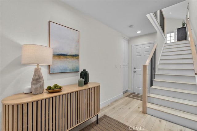 1727 Spreckels Ln, Redondo Beach, CA 90278 - foyer featuring recessed lighting, baseboards, wood finished floors, and stairway