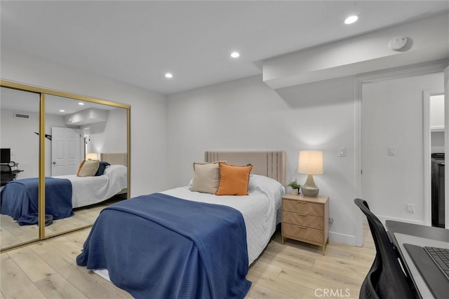1727 Spreckels Ln, Redondo Beach, CA 90278 - bedroom featuring light wood-style floors, recessed lighting, visible vents, and a closet