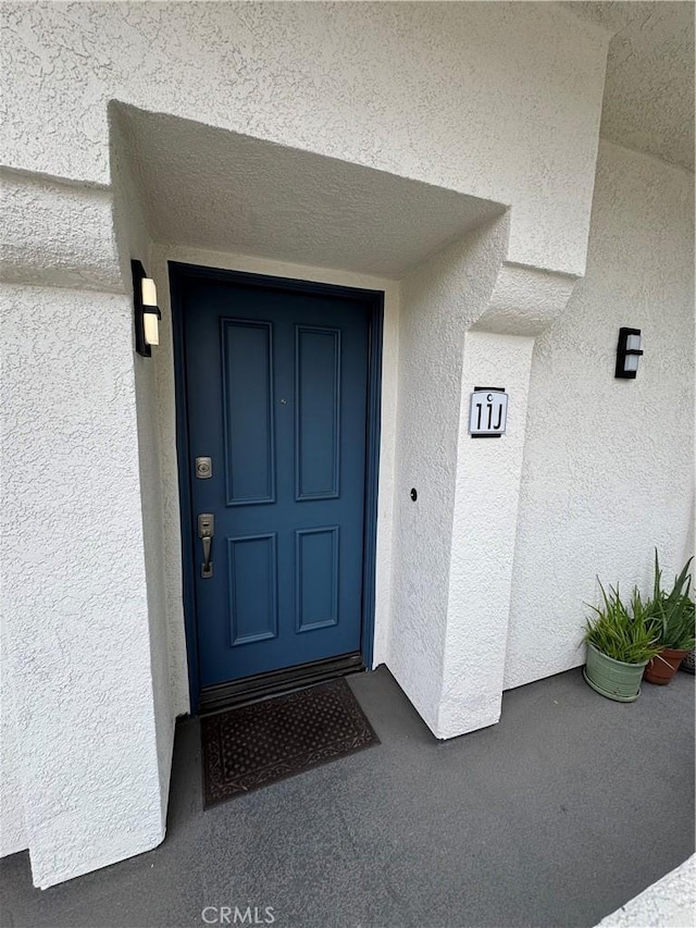 30902 Clubhouse Dr Unit 11J, Laguna Niguel, CA 92677 - entrance to property featuring stucco siding