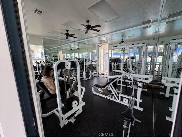 30902 Clubhouse Dr Unit 11J, Laguna Niguel, CA 92677 - workout area with a textured ceiling, visible vents, and a ceiling fan