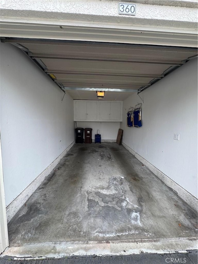 30902 Clubhouse Dr Unit 11J, Laguna Niguel, CA 92677 - garage featuring a garage door opener