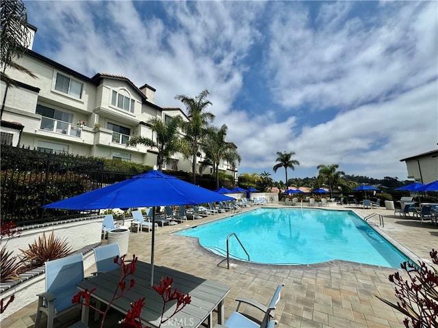 30902 Clubhouse Dr Unit 11J, Laguna Niguel, CA 92677 - community pool featuring fence and a patio area