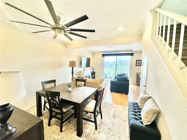 30902 Clubhouse Dr Unit 11J, Laguna Niguel, CA 92677 - dining area with light wood finished floors, a ceiling fan, stairs, and ornamental molding