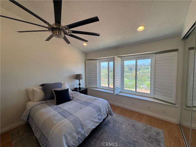 30902 Clubhouse Dr Unit 11J, Laguna Niguel, CA 92677 - bedroom with recessed lighting, baseboards, and light wood-style flooring