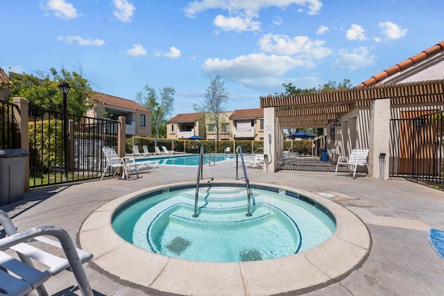 10774 Dabney Dr Unit 17, San Diego, CA 92126 - community pool featuring a community hot tub, fence, and a patio