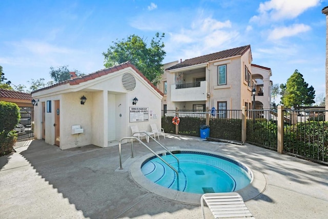 10774 Dabney Dr Unit 17, San Diego, CA 92126 - view of pool with fence and a patio area