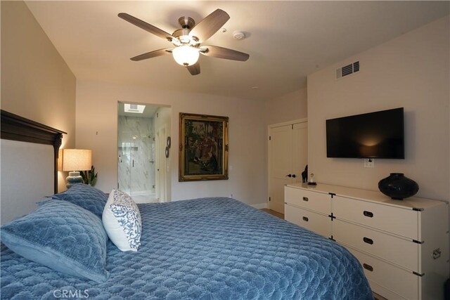 bedroom featuring baseboards, a ceiling fan, and visible vents