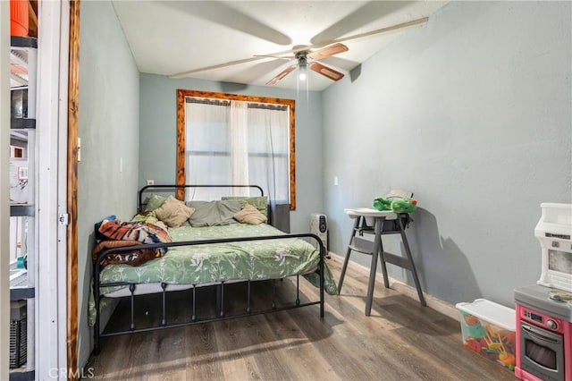 16117 Sweetaire Ave, Lancaster, CA 93535 - bedroom featuring wood finished floors, baseboards, and ceiling fan