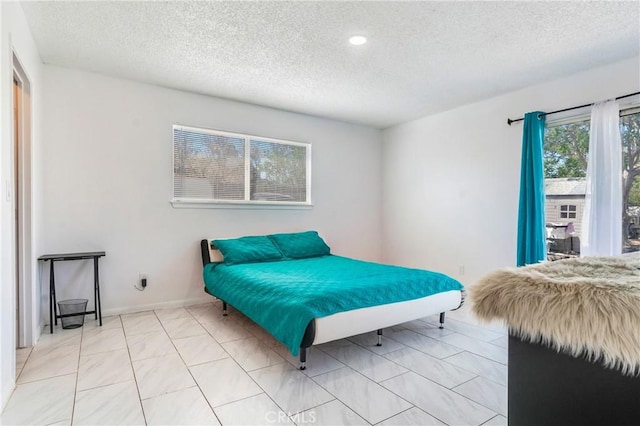16117 Sweetaire Ave, Lancaster, CA 93535 - bedroom featuring a textured ceiling, baseboards, and recessed lighting